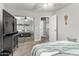 This bedroom features neutral colors, ceiling fan, and a mirrored closet at 34990 N Spur Cir, San Tan Valley, AZ 85144