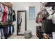 This closet features ample storage with shelves, bars and a mirror at 34990 N Spur Cir, San Tan Valley, AZ 85144