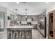 Modern kitchen with stainless steel appliances, ample counter space, and a stylish backsplash at 34990 N Spur Cir, San Tan Valley, AZ 85144