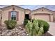 Charming single-story home featuring desert landscaping, a terracotta roof, and a welcoming front entrance at 4203 E Narrowleaf Dr, Gilbert, AZ 85298