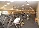 Well-equipped fitness center with treadmills, exercise bikes, and various weight machines for a comprehensive workout at 4203 E Narrowleaf Dr, Gilbert, AZ 85298