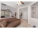 Comfortable living room featuring tile floors and seamless flow into the kitchen area at 4203 E Narrowleaf Dr, Gilbert, AZ 85298