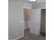 Neutral-toned bedroom with carpeted floor and a closet at 43818 W Arizona Ave, Maricopa, AZ 85138