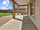 Spacious covered patio featuring a built-in BBQ grill, ideal for outdoor dining and entertaining at 45717 W Ranch Rd, Maricopa, AZ 85139