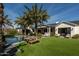 This backyard features pool, turf, and outdoor seating at 6455 E Calle Del Media --, Scottsdale, AZ 85251