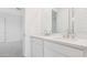 The bathroom has a double vanity with modern faucets and plenty of counter space at 7436 W Buckhorn Trl, Peoria, AZ 85383