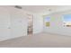 Bright bedroom with many windows and carpet floors at 7436 W Buckhorn Trl, Peoria, AZ 85383
