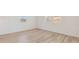 Bright bedroom with many windows and wood tile floors at 7436 W Buckhorn Trl, Peoria, AZ 85383