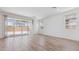 Bright living room featuring tile floors, large sliding glass doors, and neutral decor at 7436 W Buckhorn Trl, Peoria, AZ 85383