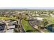 Panoramic aerial shot showing the community layout with lush green spaces and serene ponds at 755 S Arrowwood Way, Mesa, AZ 85208