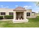 Charming front entrance with a covered porch and well-maintained landscaping at 755 S Arrowwood Way, Mesa, AZ 85208