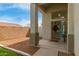 Inviting entrance with security door, floral wreath and 'welcome' sign at 927 E Baylor Ln, Gilbert, AZ 85296