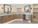 Bathroom vanity featuring double mirrors, sconce lighting and ample counter space at 9826 N 131St St, Scottsdale, AZ 85259