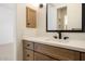 Stylish powder room with a modern vanity, elegant finishes, and a sleek mirror at 9826 N 131St St, Scottsdale, AZ 85259