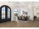 Elegant dining area boasts a coffered ceiling, statement chandelier, and large view windows at 9826 N 131St St, Scottsdale, AZ 85259