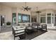 Covered outdoor seating area with comfortable furniture, ceiling fans, and open views at 9826 N 131St St, Scottsdale, AZ 85259