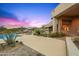 Expansive backyard featuring a pool, lounging areas, and desert-friendly landscaping with mountain views at 10325 E Celestial Dr, Scottsdale, AZ 85262