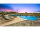 Inviting pool area with lounge chairs, desert landscaping, and sunset views, perfect for relaxation and outdoor enjoyment at 10325 E Celestial Dr, Scottsdale, AZ 85262