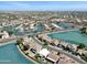 Aerial view of a lakeside community with houses surrounding the water at 10816 W Palm Ln, Avondale, AZ 85392