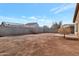 View of the backyard showcasing desert landscaping and block wall fencing for privacy at 11669 N 165Th Ave, Surprise, AZ 85388