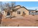 View of the backyard showing a concrete patio and a privacy fence at 11669 N 165Th Ave, Surprise, AZ 85388