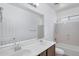 Bathroom featuring double sinks, large mirror and shower-tub combo with neutral finishes at 11669 N 165Th Ave, Surprise, AZ 85388