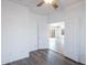 Bedroom with hardwood floors, ceiling fan and natural light at 11669 N 165Th Ave, Surprise, AZ 85388