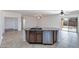 The kitchen island features a stainless dishwasher and sink, with tile flooring at 11669 N 165Th Ave, Surprise, AZ 85388