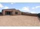 Spacious backyard featuring a large dirt area and block wall fencing, perfect for creating your dream outdoor space at 13512 W Copperleaf Ln, Peoria, AZ 85383