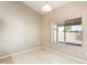 Neutral bedroom featuring a window with natural light at 13536 W Peck Dr, Litchfield Park, AZ 85340