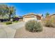 Well maintained home with desert landscaping and a two-car garage at 13536 W Peck Dr, Litchfield Park, AZ 85340