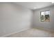 Neutral bedroom with carpet, natural light from one window, and electrical outlets at 13757 W Forest Pleasant Pl, Peoria, AZ 85383