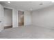 Spacious bedroom with plush carpeting, ensuite bathroom and large windows, offering plenty of natural light at 13757 W Forest Pleasant Pl, Peoria, AZ 85383