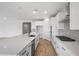 Well-equipped kitchen featuring an island, sleek appliances, and ample counter space at 13757 W Forest Pleasant Pl, Peoria, AZ 85383