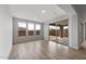 Living area filled with natural light from the sliding glass doors to the patio at 13757 W Forest Pleasant Pl, Peoria, AZ 85383
