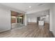 Spacious open layout with kitchen, living room and sliding door to backyard patio at 13757 W Forest Pleasant Pl, Peoria, AZ 85383
