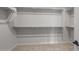 Organized walk-in closet with shelving and ample storage space for clothes and accessories. Neat! at 13757 W Forest Pleasant Pl, Peoria, AZ 85383