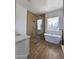 Modern bathroom with a frameless glass shower and a standalone soaking tub at 2133 N Valley Dr, Apache Junction, AZ 85120