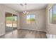 Bright dining room with sliding glass doors to the backyard and views of the yard at 23805 N 163Rd Dr, Surprise, AZ 85387