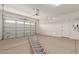 Spacious garage with bright lighting, water heater and new door ready for vehicles at 23805 N 163Rd Dr, Surprise, AZ 85387