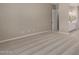 Bedroom with carpet and access to ensuite bathroom at 23805 N 163Rd Dr, Surprise, AZ 85387