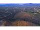 Picturesque aerial view of a desert landscape, highlighting community and mountain views at 39332 N Old Stage Rd, Cave Creek, AZ 85331