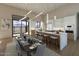 Bright, modern kitchen with sleek countertops, a large island, and expansive windows offering scenic views at 39332 N Old Stage Rd, Cave Creek, AZ 85331