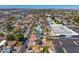 Scenic aerial view of a sprawling residential area featuring tree-lined streets and well-maintained homes at 440 W 1St W St, Mesa, AZ 85201