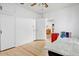 Bedroom featuring hardwood floors, a ceiling fan, and a closet at 440 W 1St W St, Mesa, AZ 85201