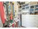 Walk-in closet with custom shelves, drawers, and ample hanging space at 486 E Devon Dr, Gilbert, AZ 85296