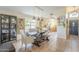 Inviting dining area with a rustic wood table and stylish light fixtures at 486 E Devon Dr, Gilbert, AZ 85296