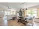 Bright living room featuring tile floors, modern furnishings, and ample natural light at 486 E Devon Dr, Gilbert, AZ 85296