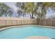 Enjoy the refreshing, fenced in backyard pool, ideal for relaxation and recreation in a private setting at 486 E Devon Dr, Gilbert, AZ 85296