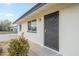 Inviting home entrance featuring modern door and manicured landscaping at 562 N 104Th St, Mesa, AZ 85207